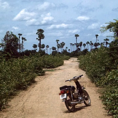 My moped on the road beyond Choeung Ek