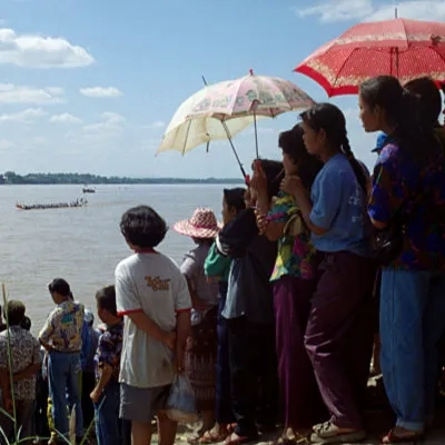 Watching a dragon boat race, Vientiane