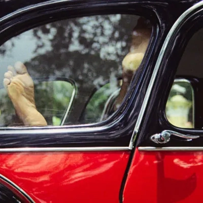 Chauffeur asleep in his car