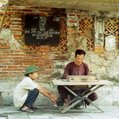 Selling lottery tickets, Hanoi